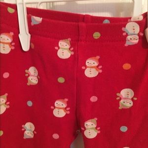 Red snowman pants.